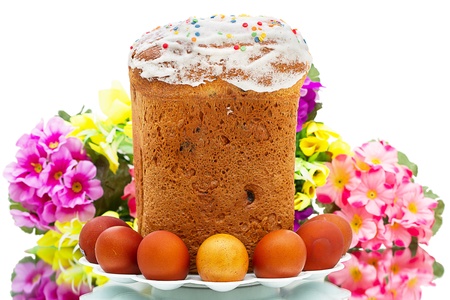 Traditional an Easter cake and eggs on a white background