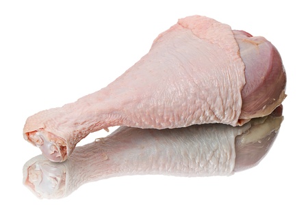 Fresh raw turkey leg isolated on white backgroundの写真素材