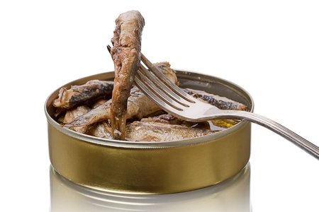 Tin and a fork with sprats  Isolated on white backgroundの写真素材