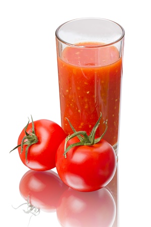 Fresh tomatoes and juice isolated on white backgroundの写真素材