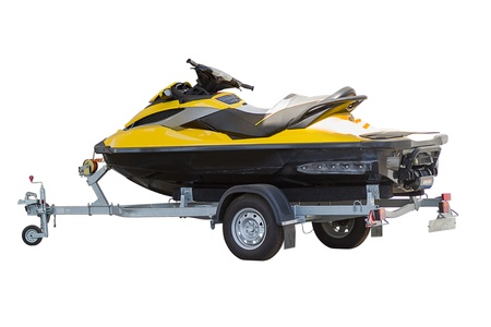 Yellow jetski on a trailer isolated on white backgroundの写真素材