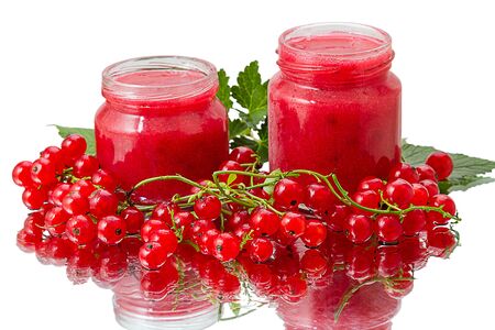 Two jars preserves of red currant and ripe berry の写真素材