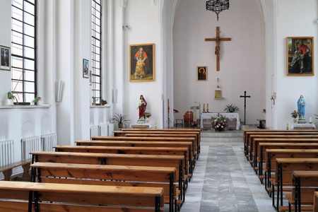 Peaceful view of the interior of a Catholic church, calm afternoon lighting, no people のeditorial素材