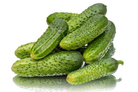 Heap ripe green cucumber isolated on white backgroundの写真素材