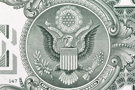 Macro shot of the seal of the United States on the US  dollarの写真素材