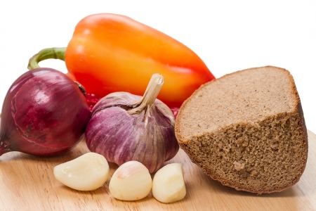 Rye bread and spices (onion, garlic and sweet peppers) Food still life.の写真素材