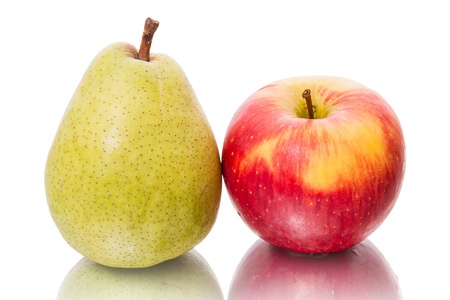 Green pear and red apple isolated on a white backgroundの写真素材