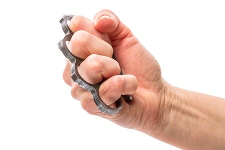 Fist with metal  knuckles isolated on white backgroundの写真素材
