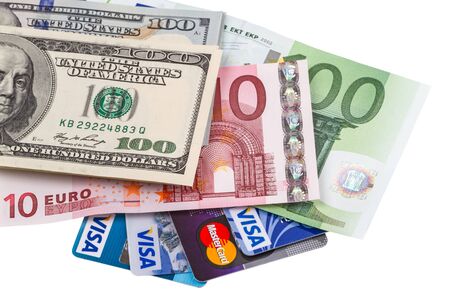 Tambov, Russian Federation - May 25, 2014: Background of cash (dollars and euros) and credit cards...