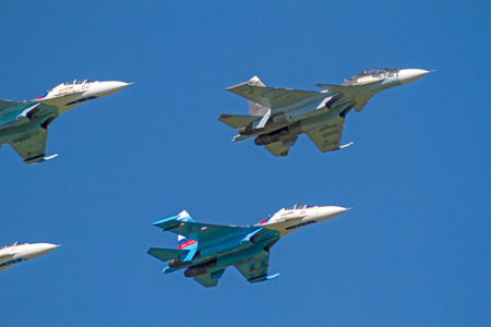 Tambov, Russia, May 31, 2014   Traditional air show in Tambov  Jet fighter aircrafts Su-27  Flanker  and   Su-30SM   Flanker-C  in the blue sky   Sunny summer dayのeditorial素材