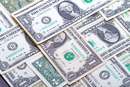 Background of one dollar banknotes close-upの写真素材