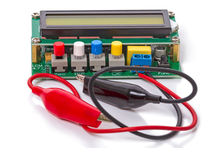 Homemade Electronic Meter LC numerical scale. Isolated on white backgroundの写真素材