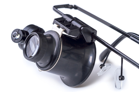 Magnifying Glass Monocle Magnifer hours to repair isolated on a white backgroundの写真素材