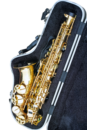 Saxophone in open case isolated on a white backgroundの写真素材