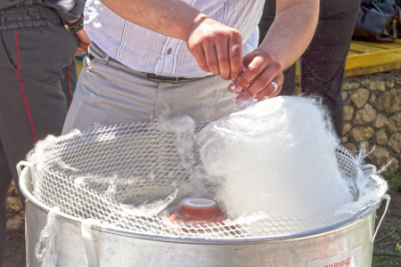 Cotton candy (also known as fairy floss in Australia, candy floss in South Africa, the UK and New Zealand) is a form of spun sugar. According to the New York Times, the confection "is almost 99.999 percent sugar"の写真素材