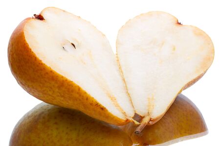 Two halves ripe yellow pears isolated on white backgroundの写真素材