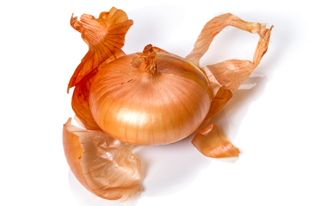 Bulb and onion peel isolated on white backgroundの写真素材