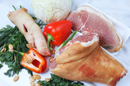 Pork meat and fresh vegetables for cooking
の写真素材