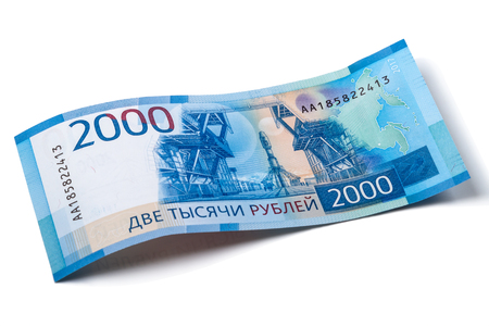 Curved new denomination of Russian paper money 2000 rubles on a white backgroundの写真素材