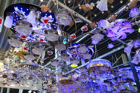 Background of various household chandeliers and lampsの写真素材