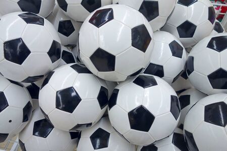 A big pile of new footballs. Sports backgroundの写真素材