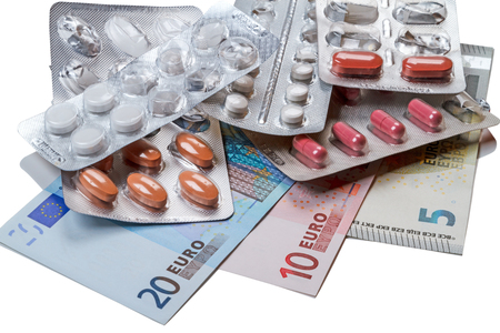 Various tablets and paper euro banknotesの写真素材