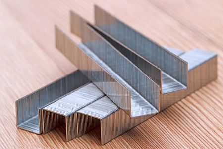 Metal staples for construction stapler on the board
の写真素材