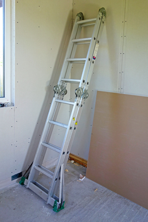 Repair in the room and the metal stepladder transformerの写真素材