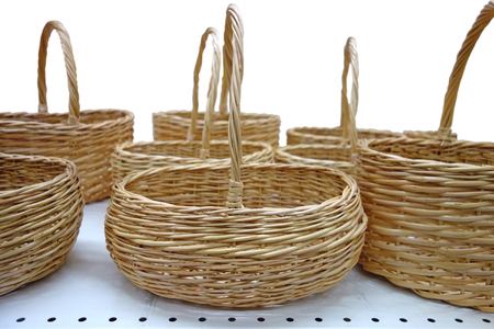 Wicker baskets isolated on a white backgroundの写真素材