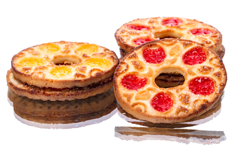 Round biscuits with holes on the mirror isolated on white backgroundの写真素材