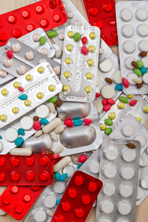 Background from a pile of various medical pillsの写真素材