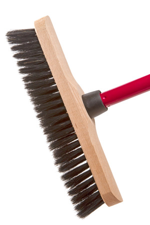 Wooden cleaning brush for sweeping and washing cars isolated on white backgroundの写真素材