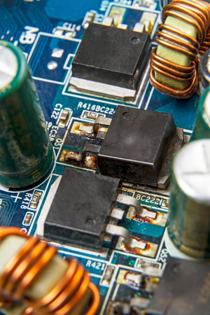 Blown MOSFET transistor  on a computer motherboardのeditorial素材
