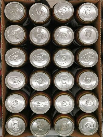 Twenty four beer cans in a box. View from aboveの写真素材