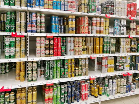 Tambov, Russia - August 15, 2019: Various can beer in supermarket shelvesのeditorial素材