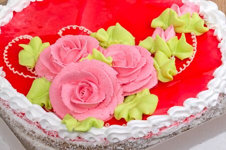 Cake with flower pink roses closeupの写真素材