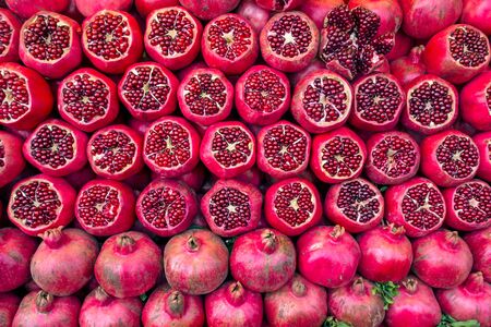Background from heaps Ripe pomegranatesの写真素材