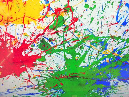 Blurred Decorative blot multi-colored paints on whiteの写真素材