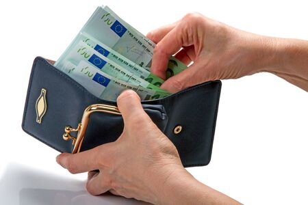 Hands and Open wallet with euro banknotes isolated on white background