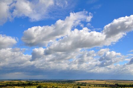 The cloudy sky over the summer steepeの写真素材