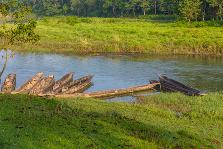 Boats of Rapti River in the Royal Chitwan National Park, Nepal