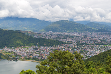 View of the Pokhara city, Nepal and Phewa Lake.  Pokhara is the starting point for most of the treks in the Annapurna area.の写真素材