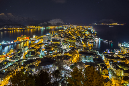 Panoramic view of the town of Ãlesund by night from Aksla hill. It is a sea port, and is noted for its concentration of Art Nouveau architecture.の写真素材