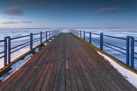Pier in Chalupy village in northern Poland in winter season.