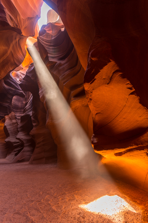 Upper Antelope Slot Canyon showing a light beam into the canyon, Page, Arizona, USA. The most popular location for photographers and sightseers.の写真素材
