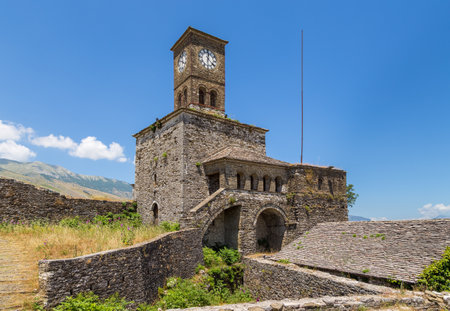 Gjirokaster Albania- 28 June 2014: Clock tower in Gjirokaster castle, a UNESCO World Heritage site in south of Albania.のeditorial素材
