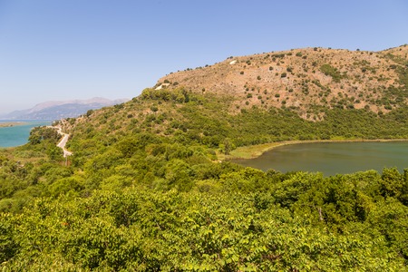 View of the mountains and lagoon Butrint, south Albaniaの写真素材