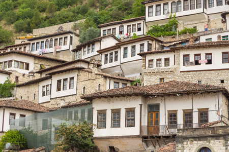 Berat, Albania- 30 June 2014: View of the historical district of Managlem. Ottoman architecture, Unesco World Heritage Site.のeditorial素材