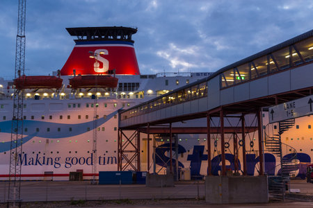 Karlskrona, Sweden- 31 August 2014: Stena Line, ferry moored in the harbor at Karlskrona at sunset time.のeditorial素材