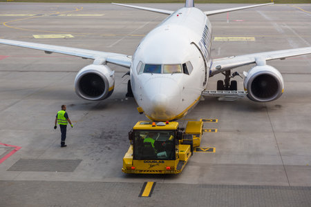 Gdansk, Poland- 19 September 2014: Aircraft line Ryanair Boeing 737-8AS ready for departure. Plane and ground service on the apron.のeditorial素材